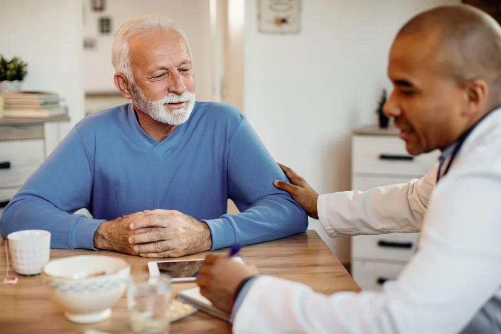 Doctor Katy Texas discussing treatment with senior patient.