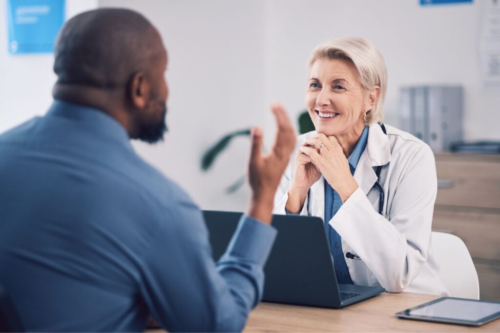 Doctor consulting with male patient.