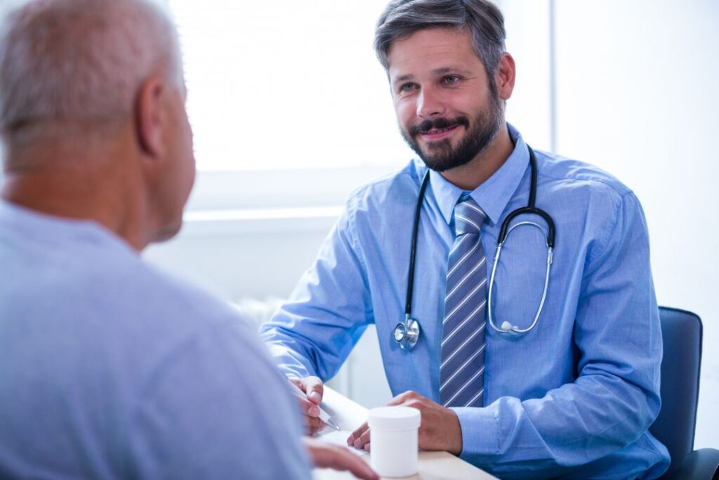 Doctor consulting with senior patient.